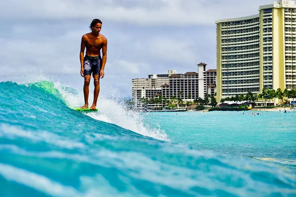 A Local Surfer At Waikiki Beach